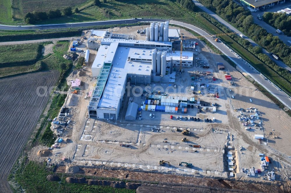 Neumünster from the bird's eye view: Construction site for the new construction of a cheese factory of the Meierei Barmstedt eG at the Donaubogen in Neumuenster in the state of Schleswig-Holstein, Germany