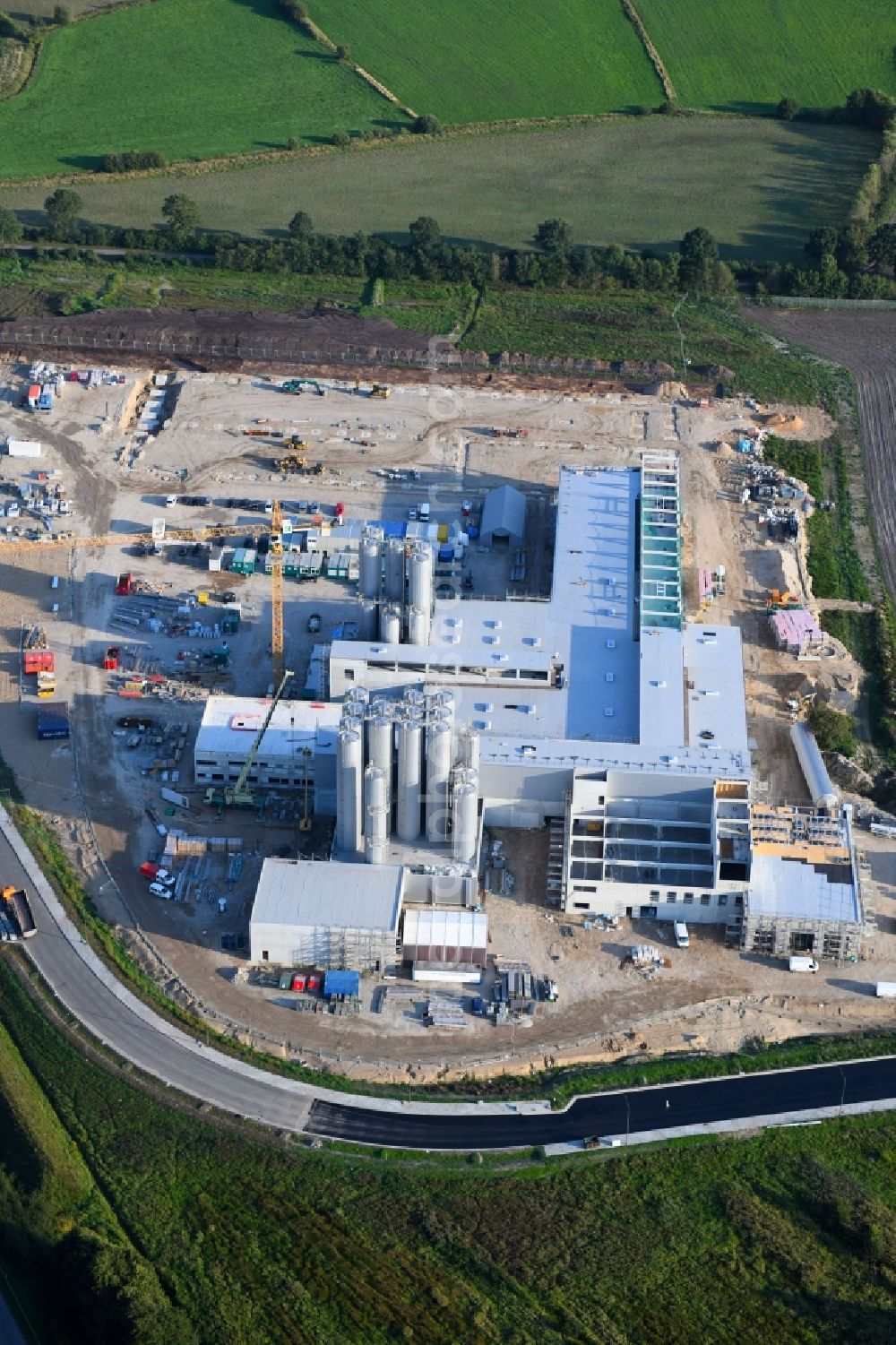 Neumünster from above - Construction site for the new construction of a cheese factory of the Meierei Barmstedt eG at the Donaubogen in Neumuenster in the state of Schleswig-Holstein, Germany