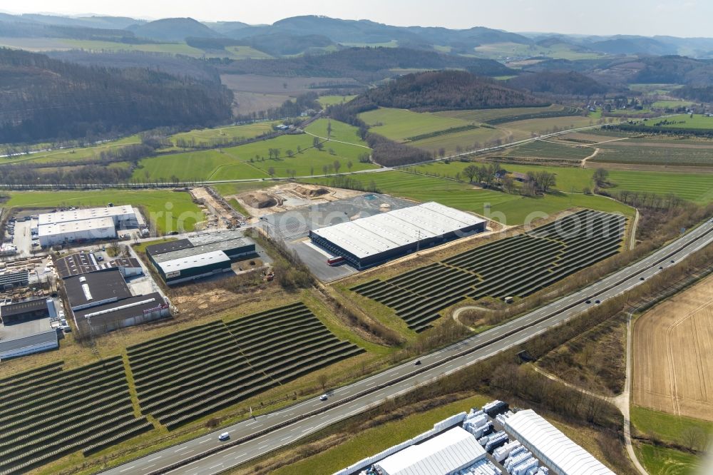 Aerial photograph Meschede - Construction site to build a new building complex on the site of the logistics center of Briloner Leuchten GmbH & Co. KG Am Steinbach in Meschede in the state North Rhine-Westphalia, Germany