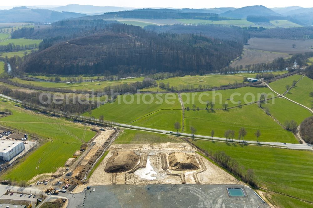 Aerial image Meschede - Construction site to build a new building complex on the site of the logistics center of Briloner Leuchten GmbH & Co. KG Am Steinbach in Meschede in the state North Rhine-Westphalia, Germany