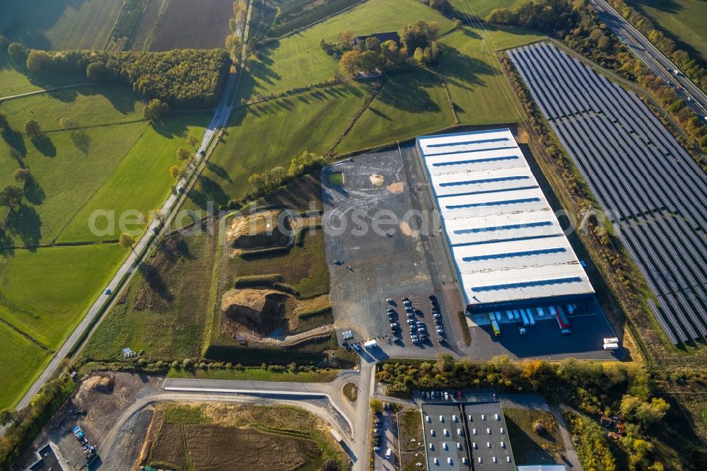 Meschede from the bird's eye view: Construction site to build a new building complex on the site of the logistics center of Briloner Leuchten GmbH & Co. KG Am Steinbach in Meschede in the state North Rhine-Westphalia, Germany