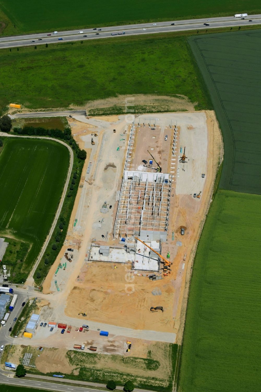 Aerial photograph Odelzhausen - Construction site for the construction of a logistics center of C.E. NOERPEL GmbH in Odelzhausen, Bavaria, Germany