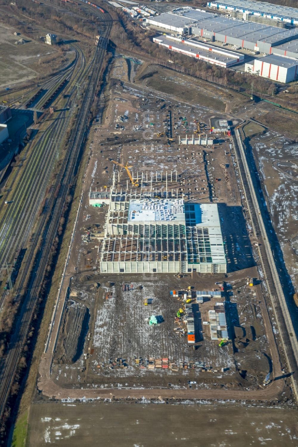 Dortmund from the bird's eye view: Construction site to build a new building complex on the site of the logistics center REWE DORTMUND Grosshandel eG on Rueschebrinkstrasse in Dortmund in the state North Rhine-Westphalia, Germany