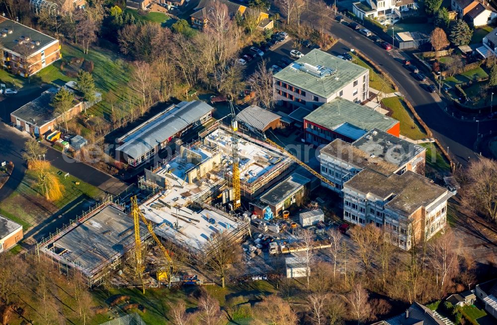 Hamm from the bird's eye view: Construction site for the new building of the LWL-Schule for patients of LWL university hospital at Heithofer Allee midst a residential area in Hamm in the state North Rhine-Westphalia