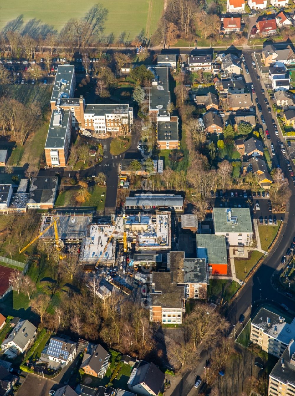 Aerial image Hamm - Construction site for the new building of the LWL-Schule for patients of LWL university hospital at Heithofer Allee midst a residential area in Hamm in the state North Rhine-Westphalia