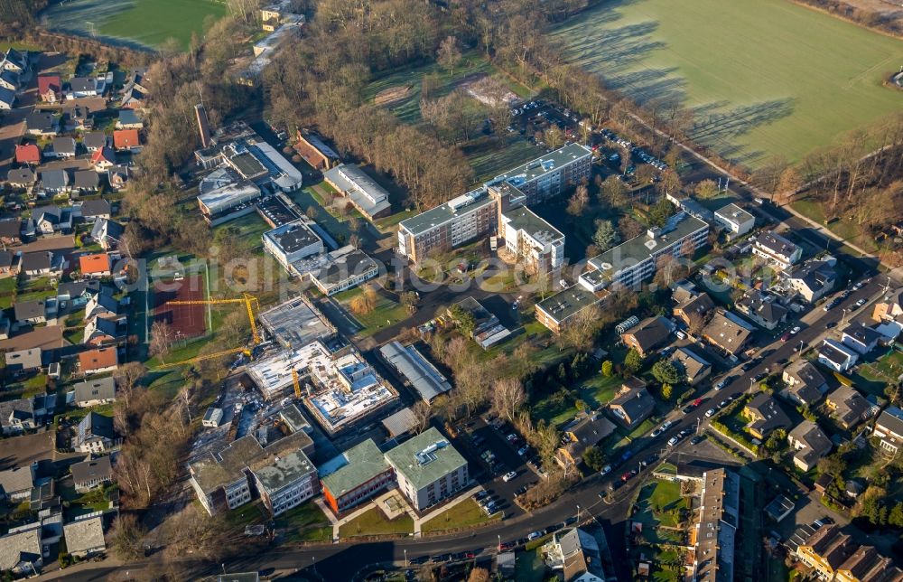 Hamm from above - Construction site for the new building of the LWL-Schule for patients of LWL university hospital at Heithofer Allee midst a residential area in Hamm in the state North Rhine-Westphalia