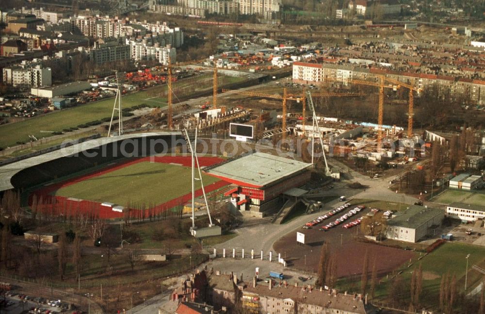 Berlin from the bird's eye view: Construction site for the new building of Max-Schmeling-Halle in Friedrich-Ludwig-Jahn-Sportpark in the district Prenzlauer Berg in Berlin, Germany