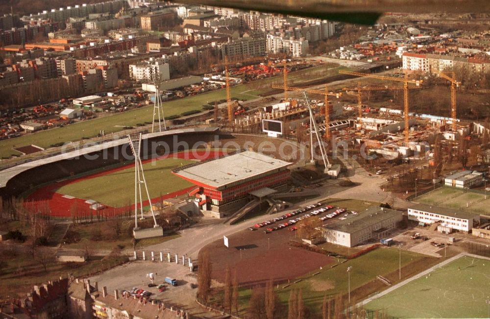 Berlin from the bird's eye view: Construction site for the new building of Max-Schmeling-Halle in Friedrich-Ludwig-Jahn-Sportpark in the district Prenzlauer Berg in Berlin, Germany