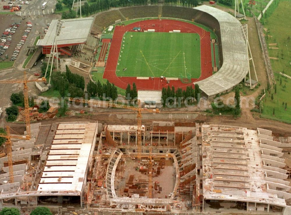 Berlin from the bird's eye view: Construction site for the new building of Max-Schmeling-Halle in Friedrich-Ludwig-Jahn-Sportpark in the district Prenzlauer Berg in Berlin, Germany