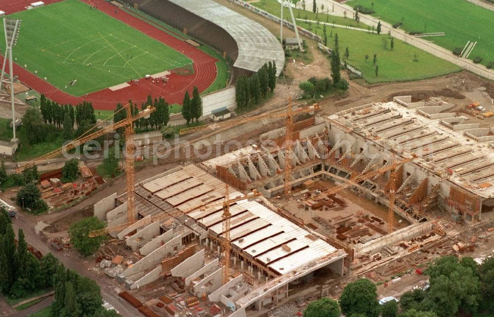 Berlin from the bird's eye view: Construction site for the new building of Max-Schmeling-Halle in Friedrich-Ludwig-Jahn-Sportpark in the district Prenzlauer Berg in Berlin, Germany