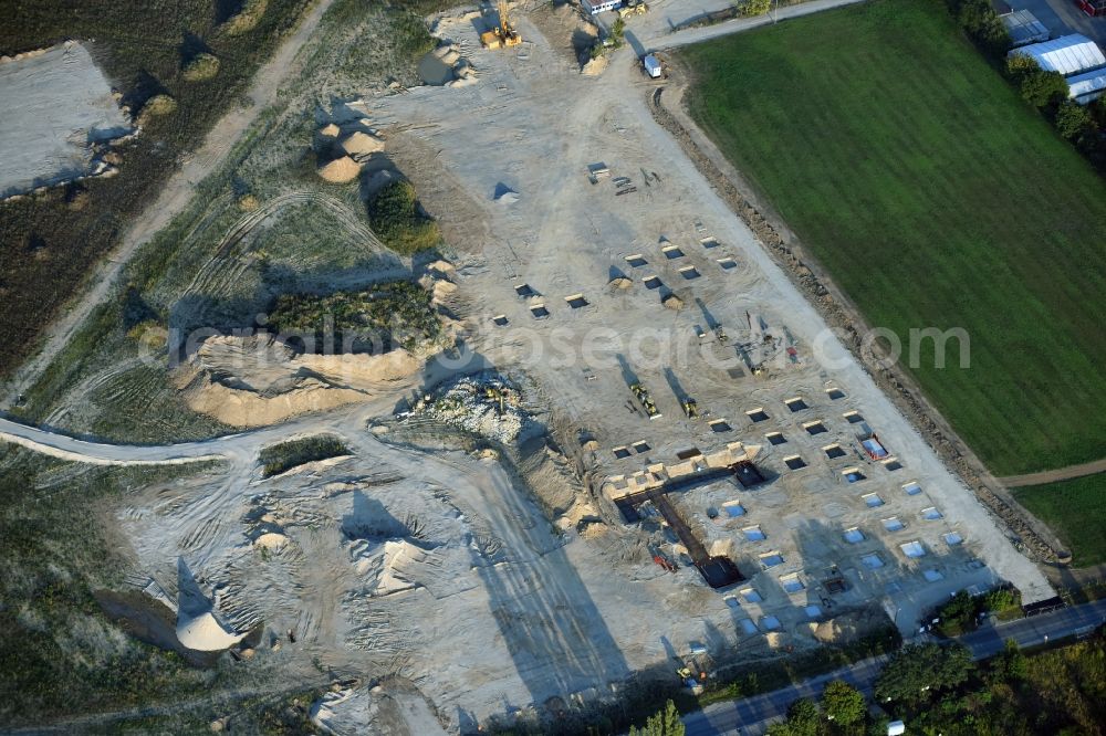 Berlin from above - Construction site for the new building home-center of the Porta-Group at Pilgramer street in the district Mahlsdorf in Berlin