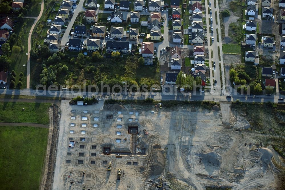 Aerial photograph Berlin - Construction site for the new building home-center of the Porta-Group at Pilgramer street in the district Mahlsdorf in Berlin