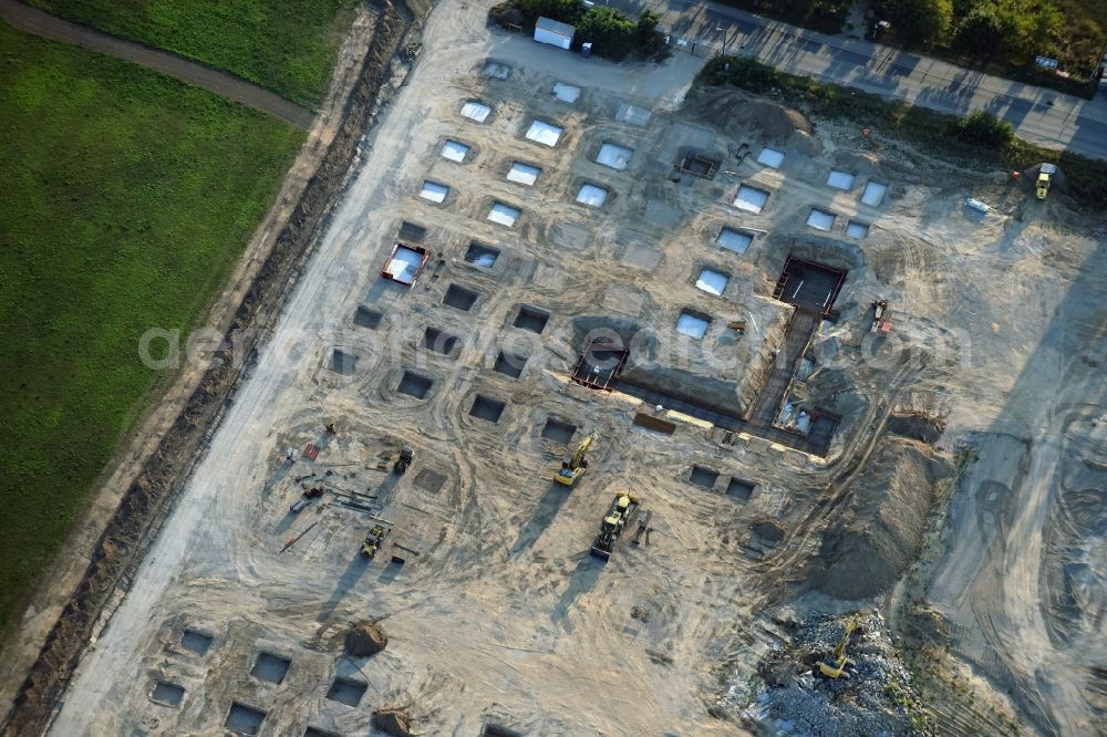 Berlin from above - Construction site for the new building home-center of the Porta-Group at Pilgramer street in the district Mahlsdorf in Berlin