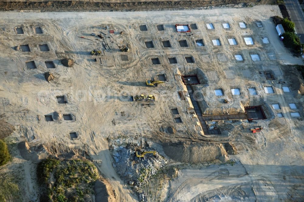 Aerial photograph Berlin - Construction site for the new building home-center of the Porta-Group at Pilgramer street in the district Mahlsdorf in Berlin