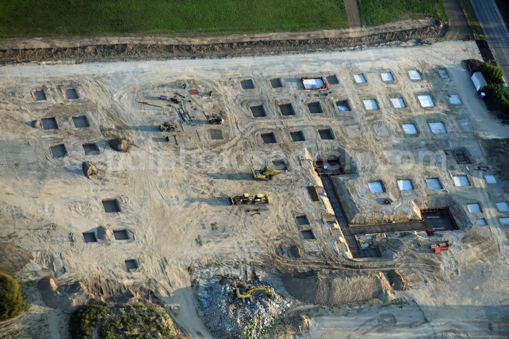 Berlin from above - Construction site for the new building home-center of the Porta-Group at Pilgramer street in the district Mahlsdorf in Berlin