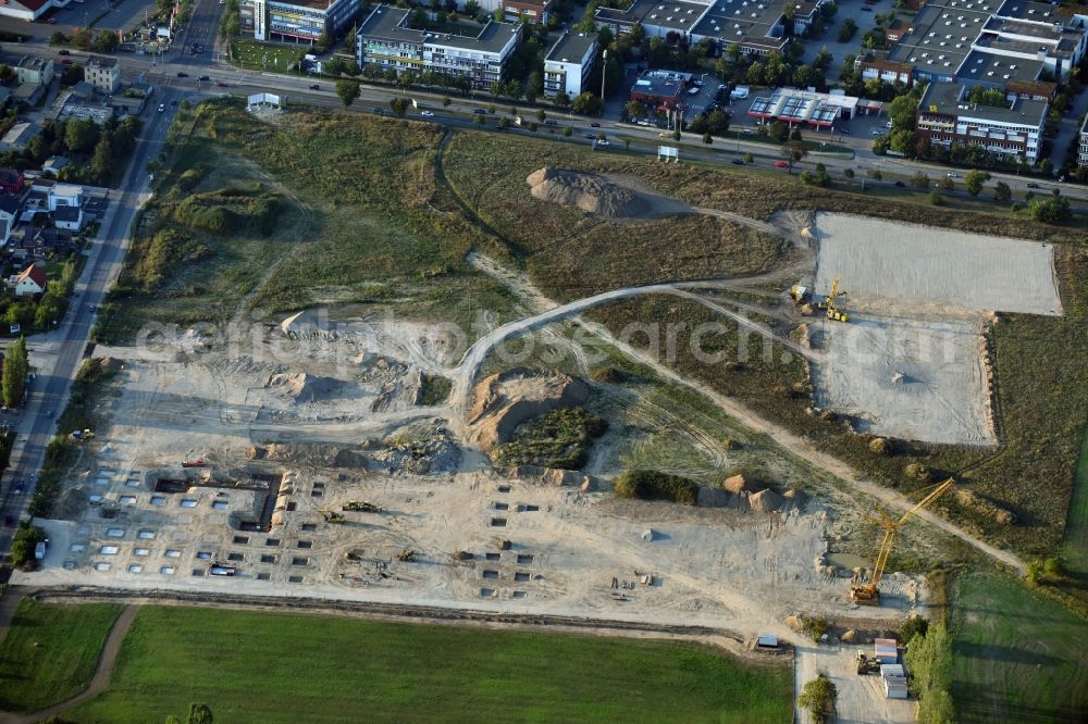 Berlin from the bird's eye view: Construction site for the new building home-center of the Porta-Group at Pilgramer street in the district Mahlsdorf in Berlin