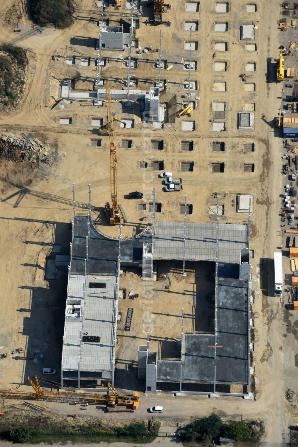 Aerial image Berlin - Construction site for the new building home-center of the Porta-Group at Pilgramer street in the district Mahlsdorf in Berlin