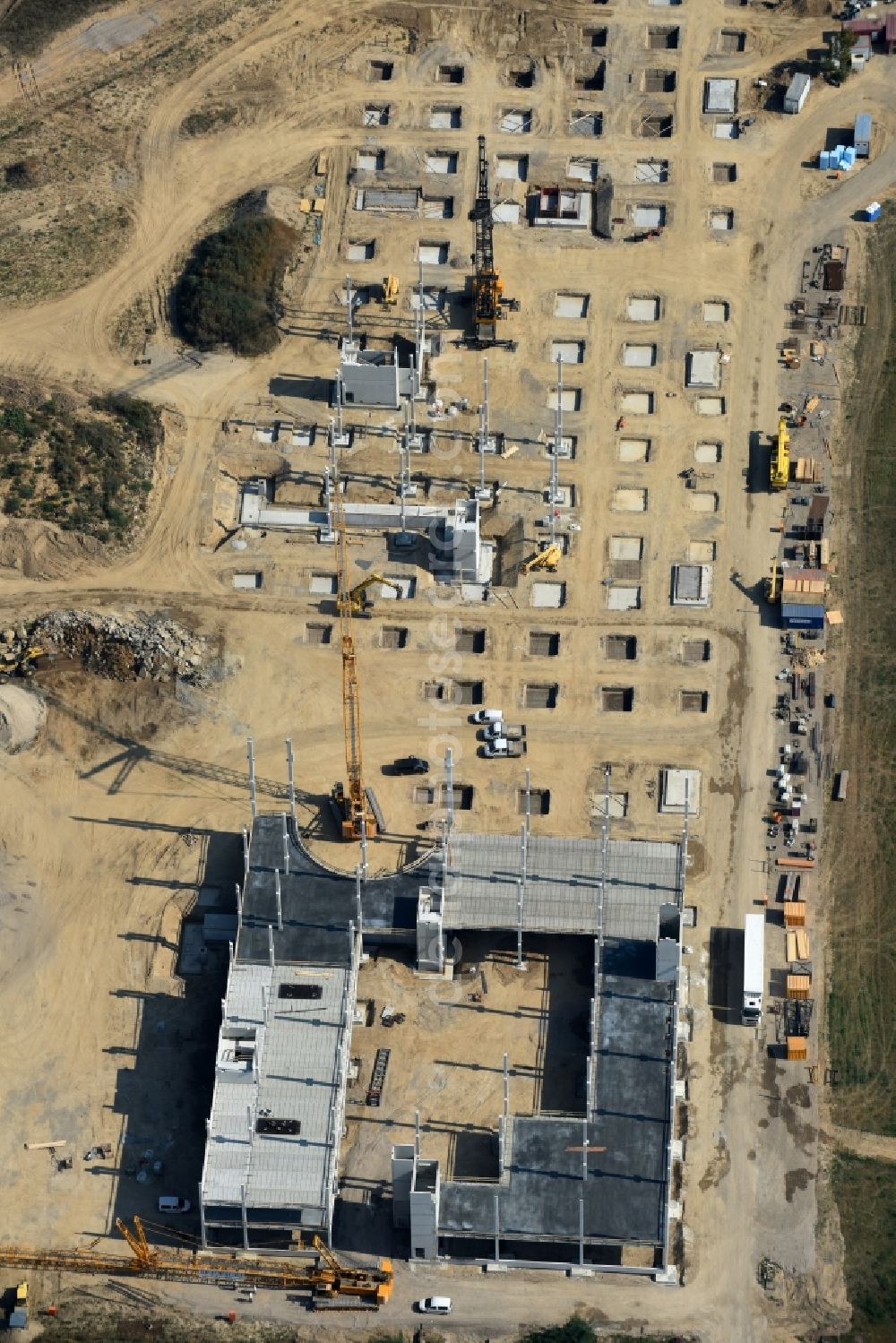 Aerial photograph Berlin - Construction site for the new building home-center of the Porta-Group at Pilgramer street in the district Mahlsdorf in Berlin