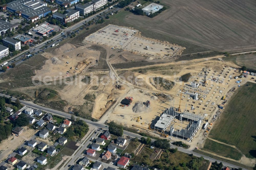 Aerial image Berlin - Construction site for the new building home-center of the Porta-Group at Pilgramer street in the district Mahlsdorf in Berlin