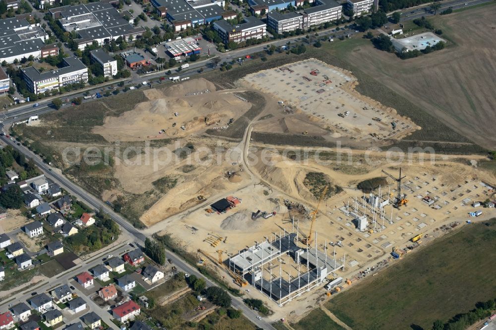 Berlin from above - Construction site for the new building home-center of the Porta-Group at Pilgramer street in the district Mahlsdorf in Berlin