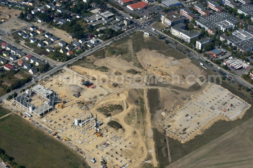 Aerial image Berlin - Construction site for the new building home-center of the Porta-Group at Pilgramer street in the district Mahlsdorf in Berlin