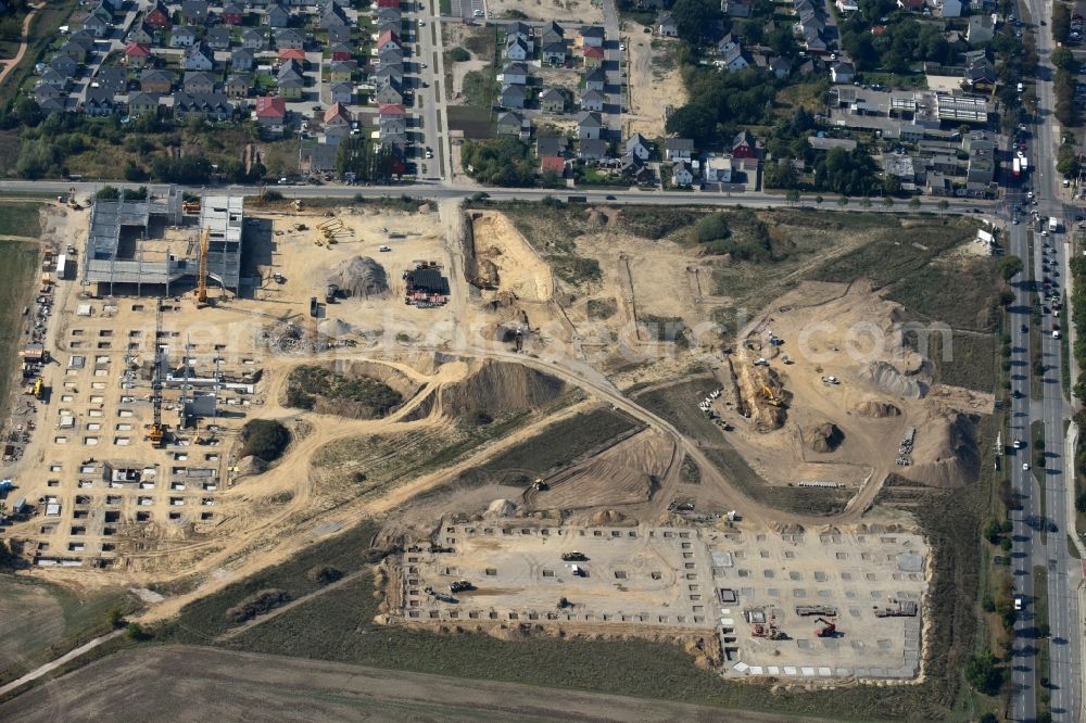 Aerial photograph Berlin - Construction site for the new building home-center of the Porta-Group at Pilgramer street in the district Mahlsdorf in Berlin