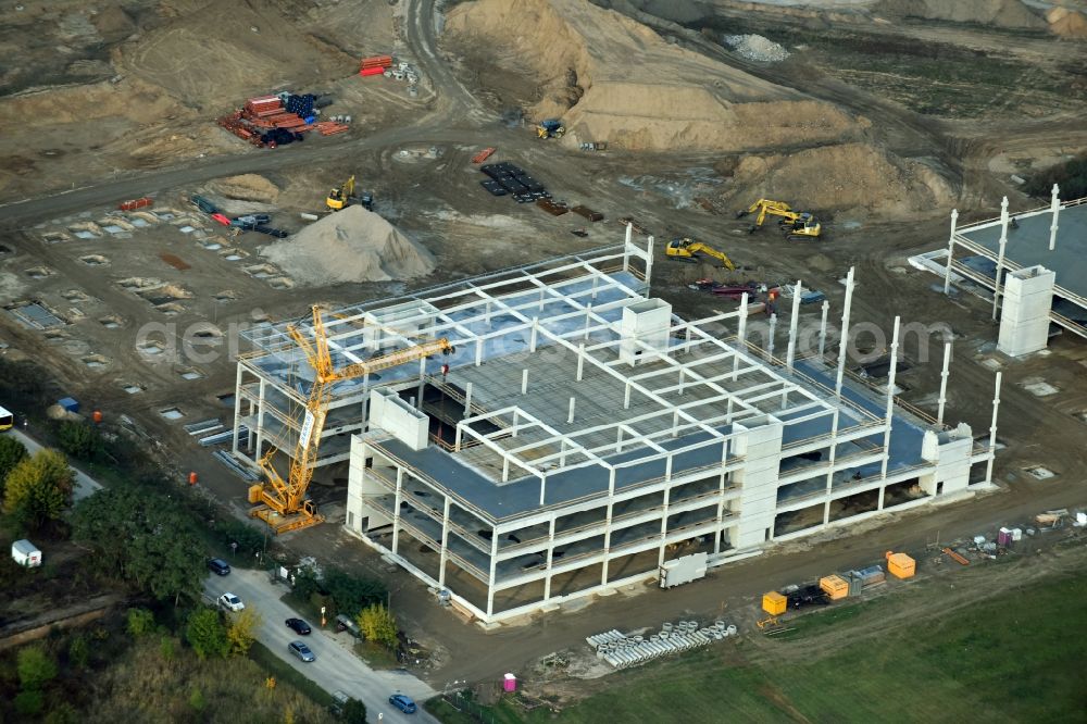 Berlin from above - Construction site for the new building home-center of the Porta-Group at Pilgramer street in the district Mahlsdorf in Berlin