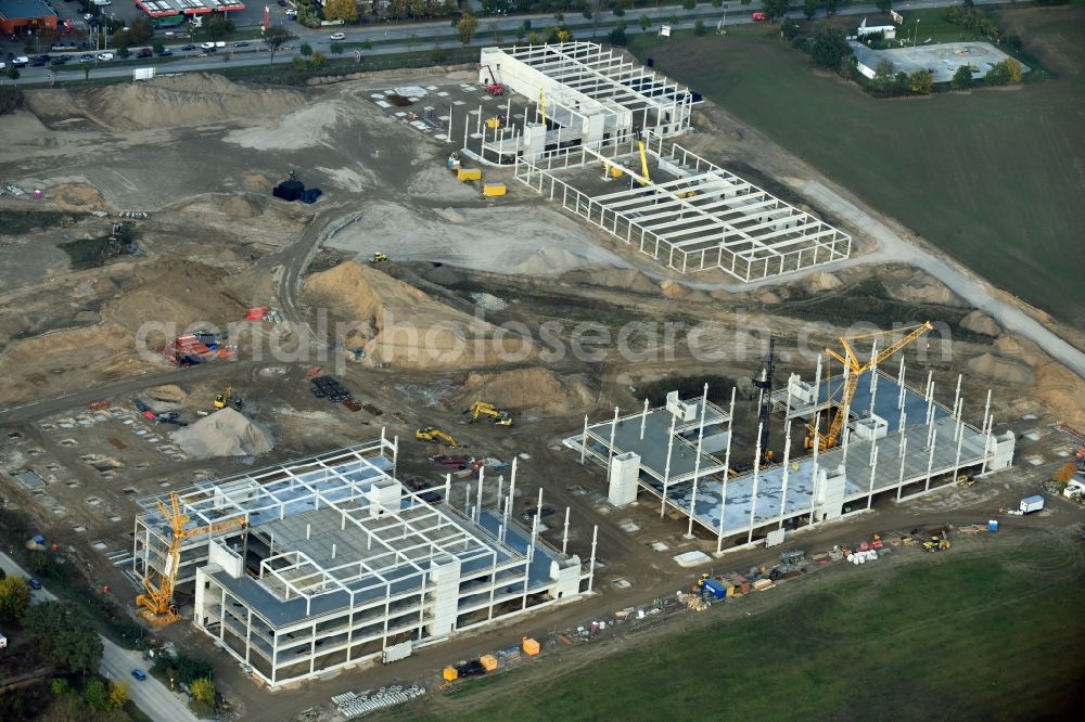 Aerial image Berlin - Construction site for the new building home-center of the Porta-Group at Pilgramer street in the district Mahlsdorf in Berlin