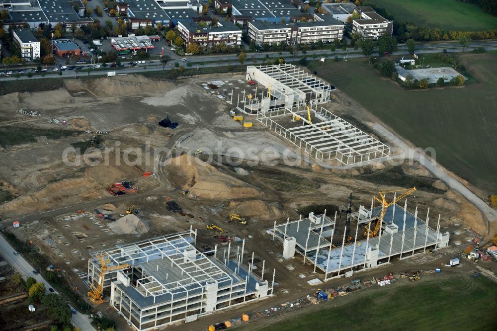 Aerial photograph Berlin - Construction site for the new building home-center of the Porta-Group at Pilgramer street in the district Mahlsdorf in Berlin