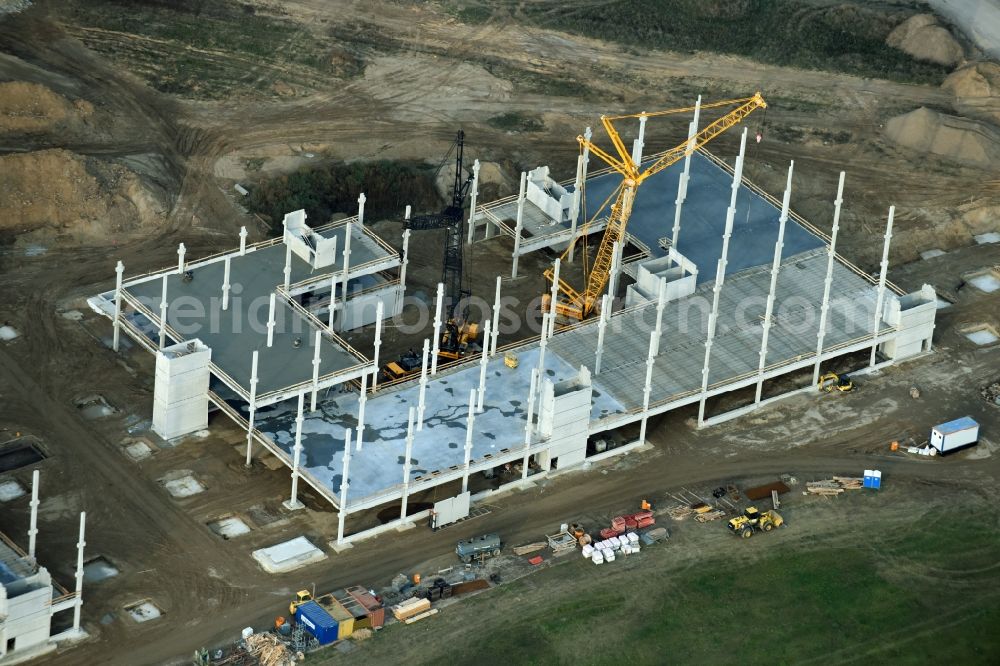 Berlin from above - Construction site for the new building home-center of the Porta-Group at Pilgramer street in the district Mahlsdorf in Berlin