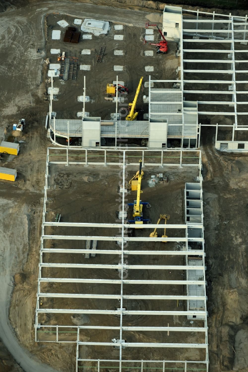 Aerial image Berlin - Construction site for the new building home-center of the Porta-Group at Pilgramer street in the district Mahlsdorf in Berlin