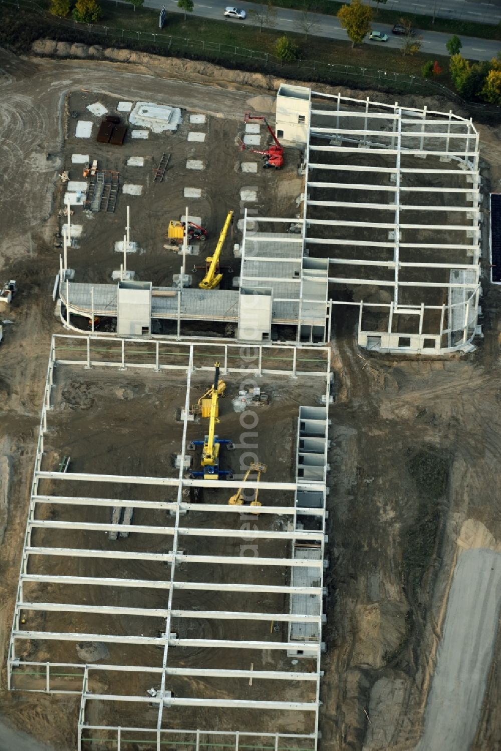 Aerial photograph Berlin - Construction site for the new building home-center of the Porta-Group at Pilgramer street in the district Mahlsdorf in Berlin