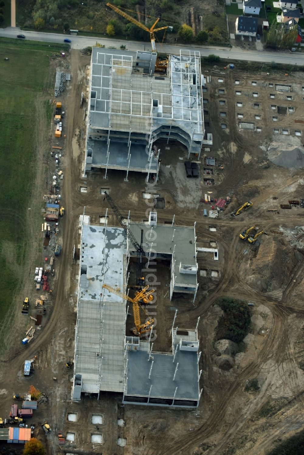 Berlin from above - Construction site for the new building home-center of the Porta-Group at Pilgramer street in the district Mahlsdorf in Berlin