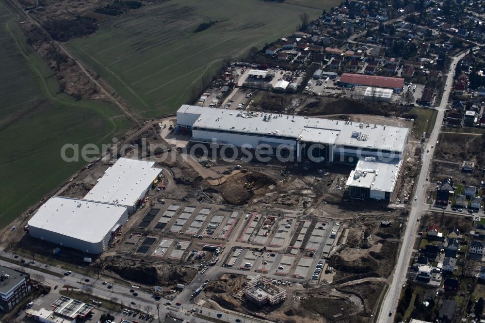 Aerial photograph Berlin - Construction site for the new building home-center of the Porta-Group at Pilgramer street in the district Mahlsdorf in Berlin