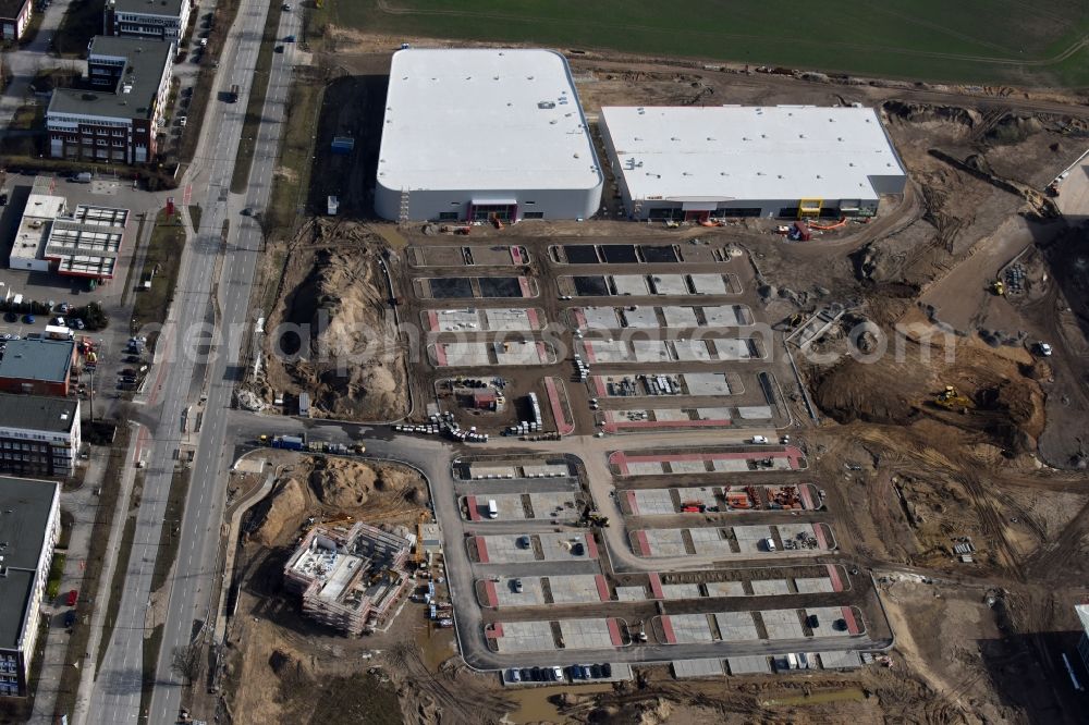 Berlin from the bird's eye view: Construction site for the new building home-center of the Porta-Group at Pilgramer street in the district Mahlsdorf in Berlin