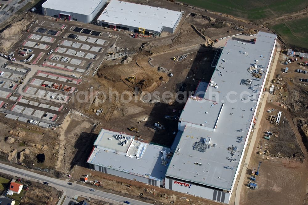 Berlin from above - Construction site for the new building home-center of the Porta-Group at Pilgramer street in the district Mahlsdorf in Berlin