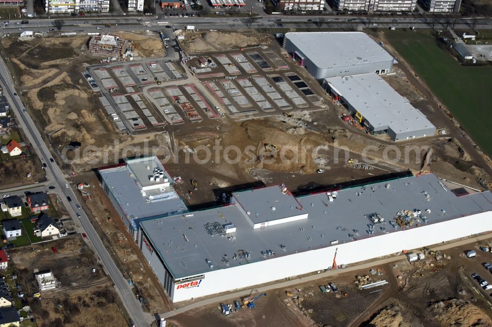 Aerial image Berlin - Construction site for the new building home-center of the Porta-Group at Pilgramer street in the district Mahlsdorf in Berlin