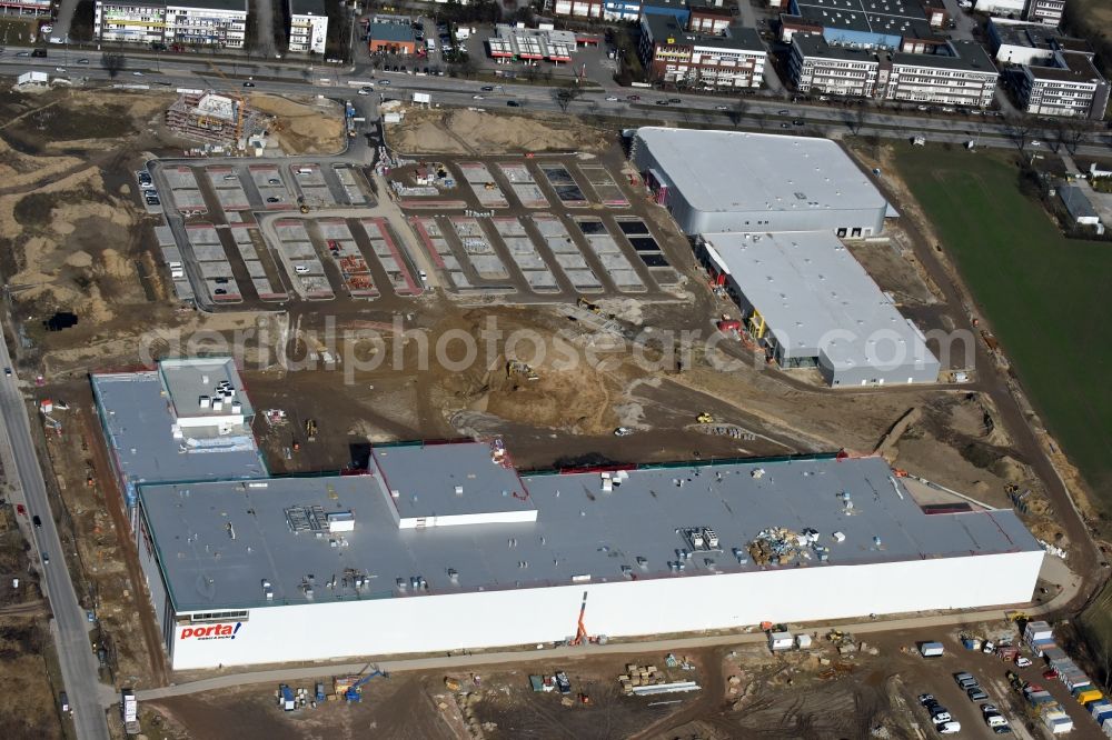 Aerial photograph Berlin - Construction site for the new building home-center of the Porta-Group at Pilgramer street in the district Mahlsdorf in Berlin