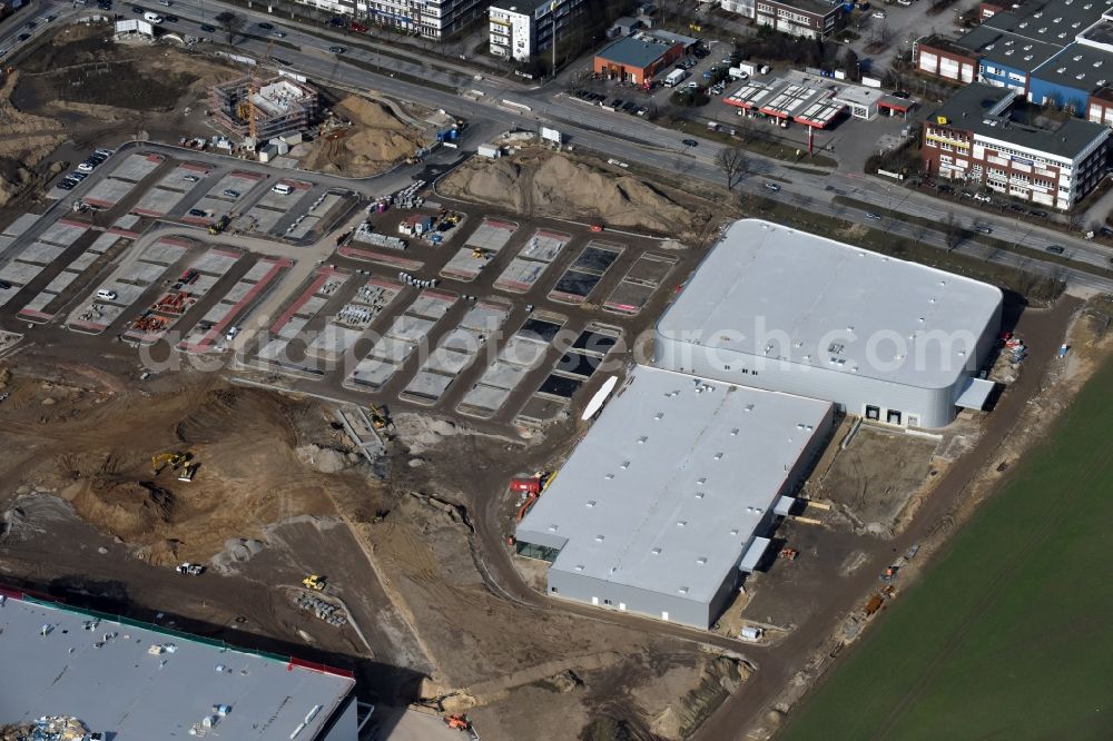 Aerial image Berlin - Construction site for the new building home-center of the Porta-Group at Pilgramer street in the district Mahlsdorf in Berlin