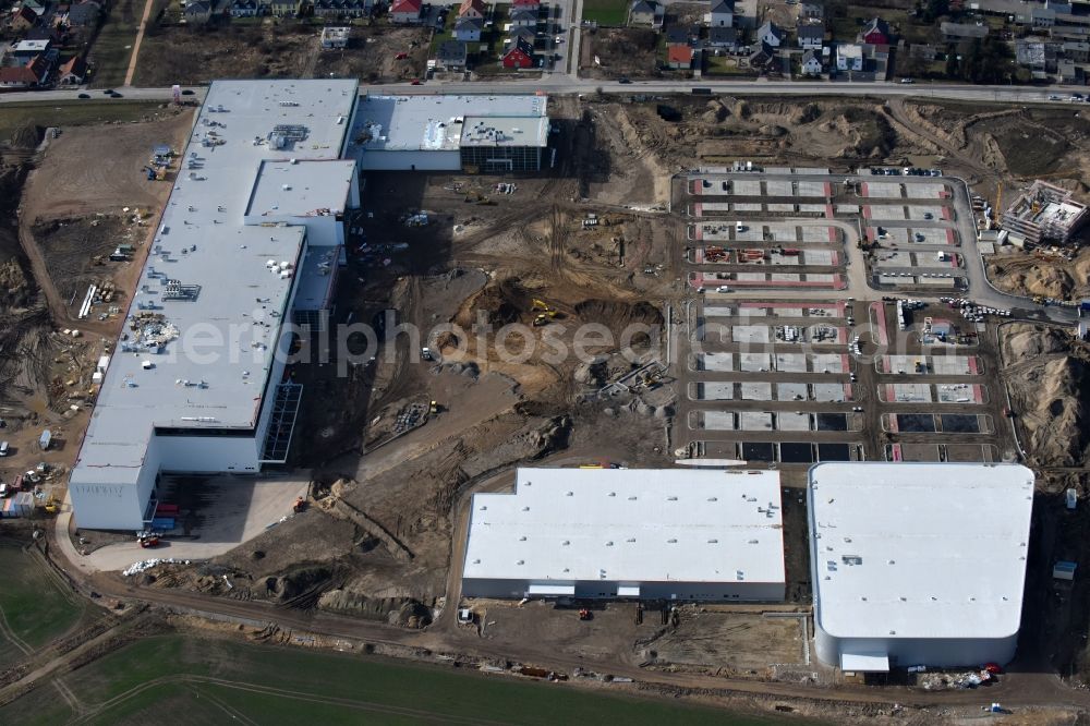 Berlin from above - Construction site for the new building home-center of the Porta-Group at Pilgramer street in the district Mahlsdorf in Berlin