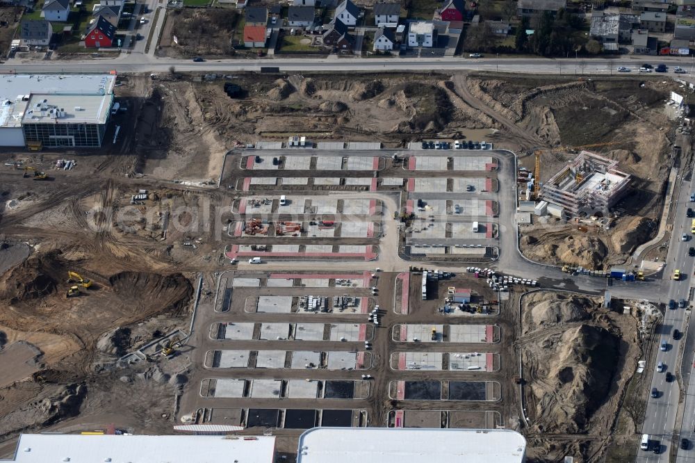 Berlin from the bird's eye view: Construction site for the new building home-center of the Porta-Group at Pilgramer street in the district Mahlsdorf in Berlin