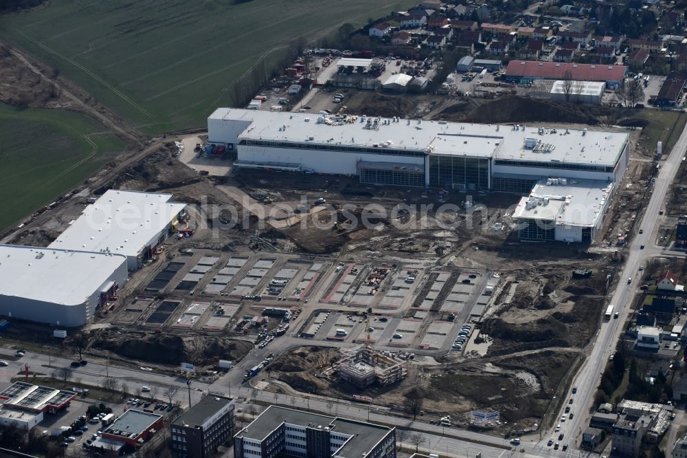 Aerial image Berlin - Construction site for the new building home-center of the Porta-Group at Pilgramer street in the district Mahlsdorf in Berlin