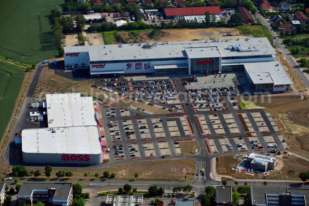 Aerial image Berlin - Construction site for the new building home-center of the Porta-Group at Pilgramer street in the district Mahlsdorf in Berlin