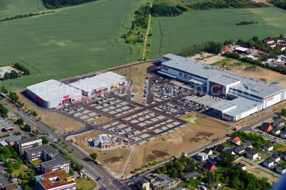 Aerial photograph Berlin - Construction site for the new building home-center of the Porta-Group at Pilgramer street in the district Mahlsdorf in Berlin