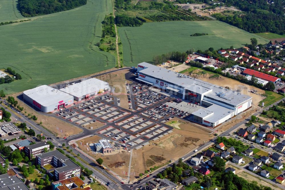 Berlin from above - Construction site for the new building home-center of the Porta-Group at Pilgramer street in the district Mahlsdorf in Berlin