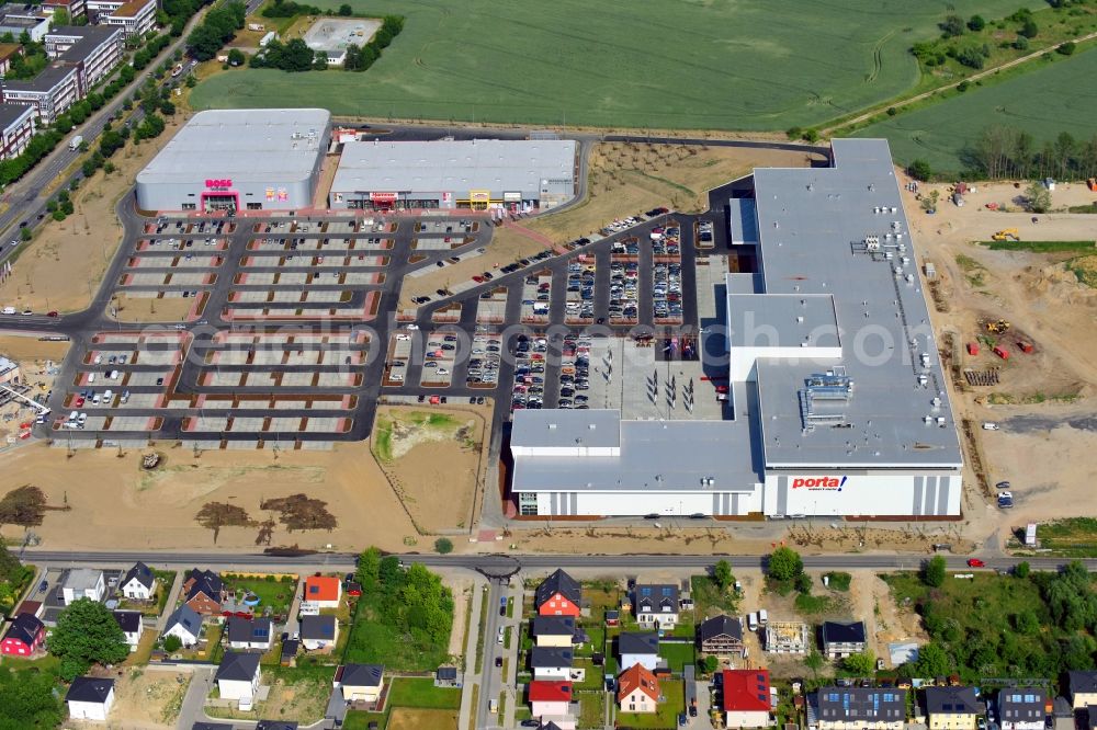 Aerial image Berlin - Construction site for the new building home-center of the Porta-Group at Pilgramer street in the district Mahlsdorf in Berlin