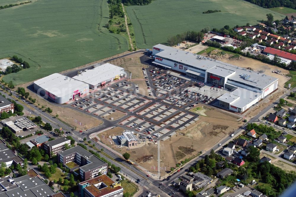 Aerial image Berlin - Construction site for the new building home-center of the Porta-Group at Pilgramer street in the district Mahlsdorf in Berlin