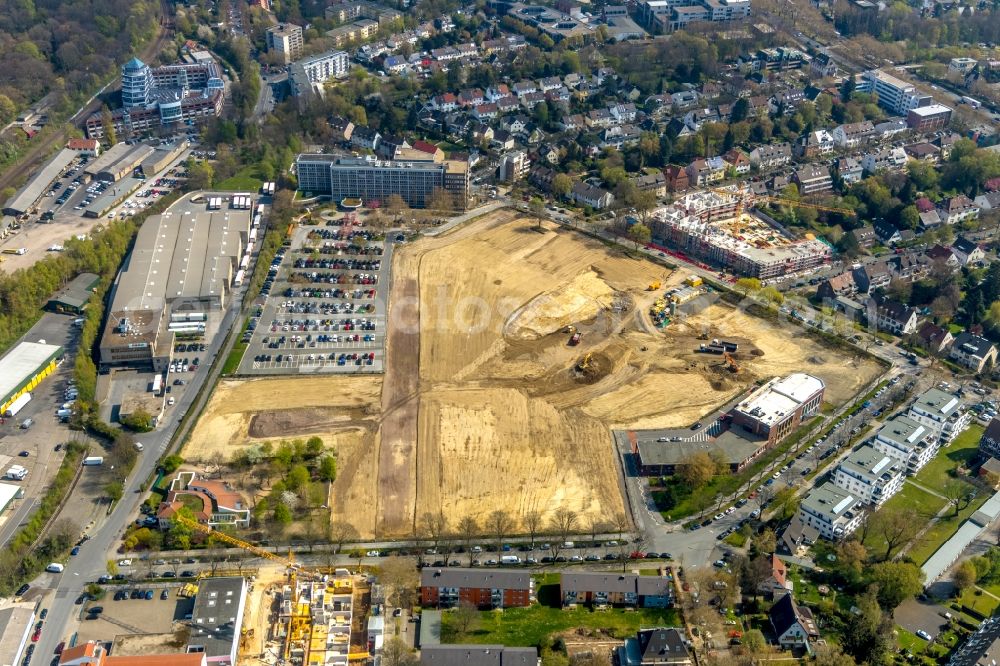 Dortmund from the bird's eye view: Construction site for the new building Mehrfamilienhaus in Dortmund in the state North Rhine-Westphalia, Germany