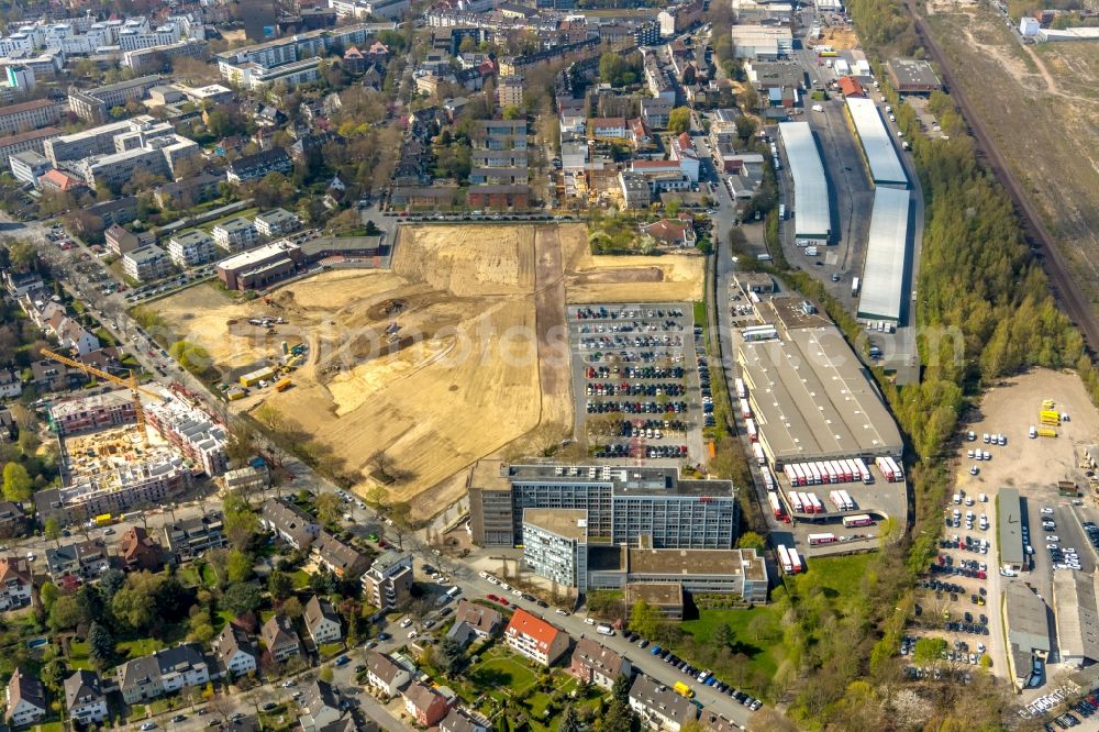 Dortmund from the bird's eye view: Construction site for the new building Mehrfamilienhaus in Dortmund in the state North Rhine-Westphalia, Germany