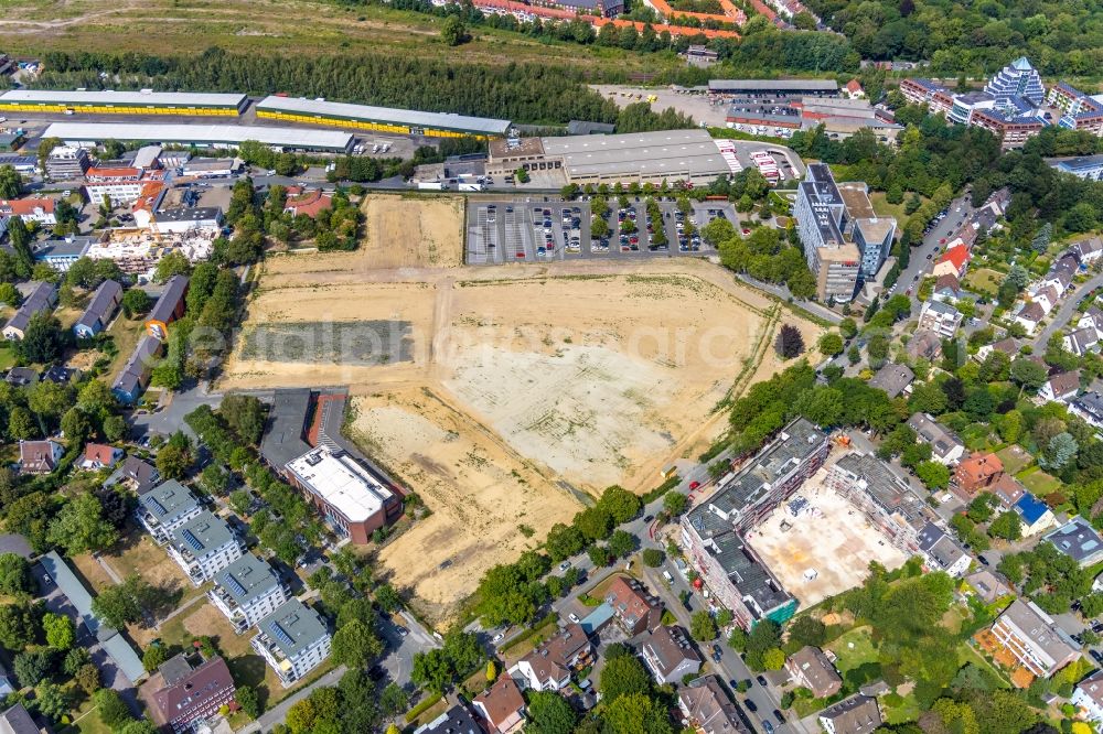 Dortmund from the bird's eye view: Construction site for the new building Mehrfamilienhaus in Dortmund in the state North Rhine-Westphalia, Germany